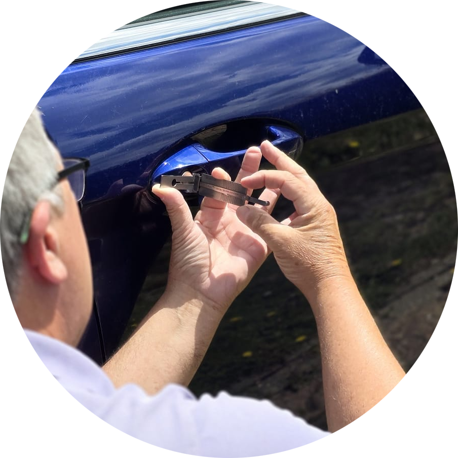 Will from The Car Key Company Sussex, unlocking a car that's had the keys stolen.